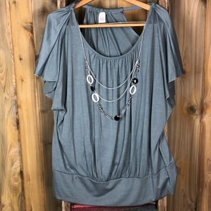 Grey bat winged blouse with built in necklace.